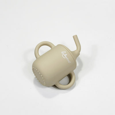 Bögre kiömlésgátló fedéllel és szívószállal Világos krém színben